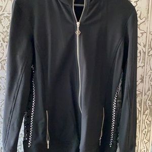 Women’s black jacket with studs by Crystalline